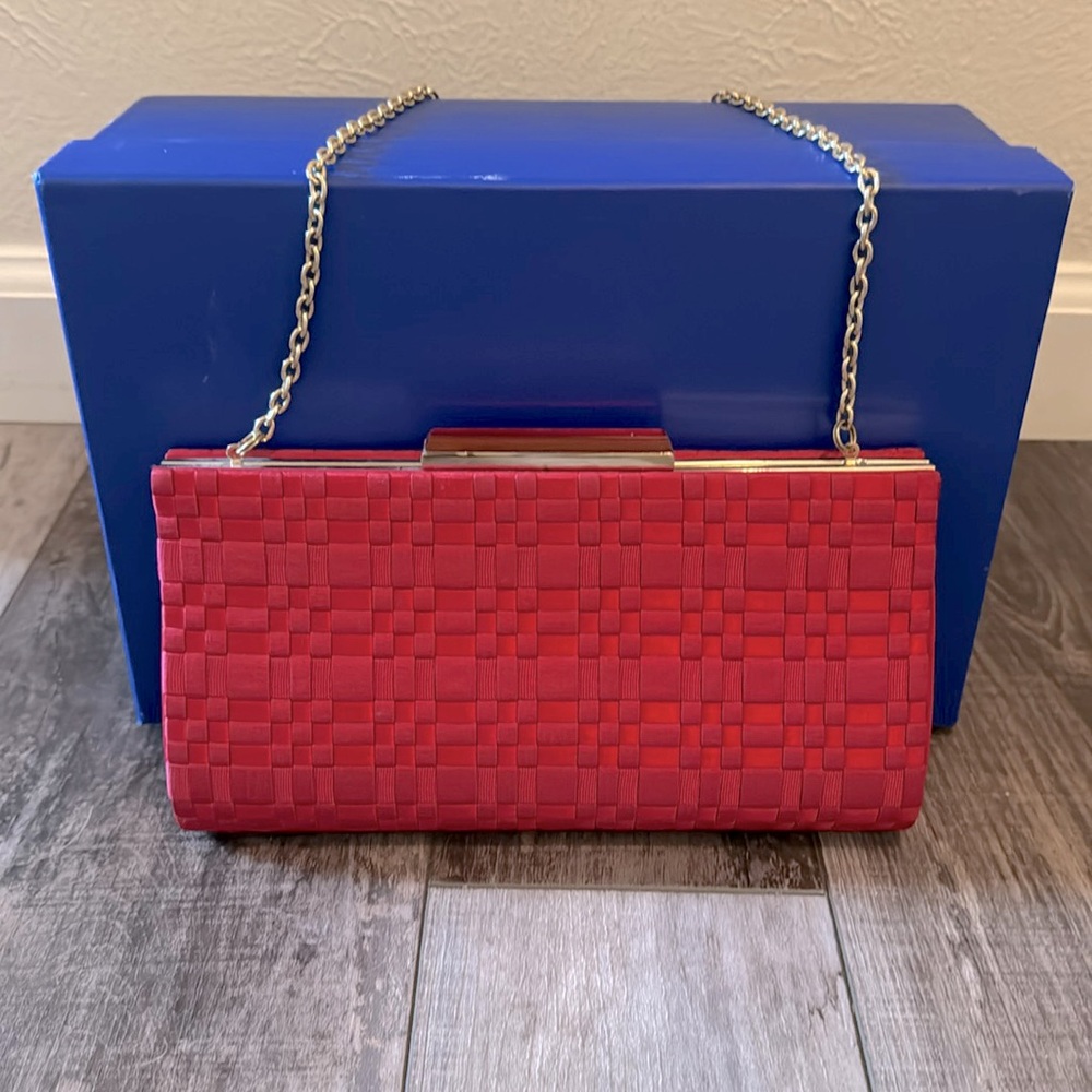 Red clutch from banana Republic with removable chain strap.